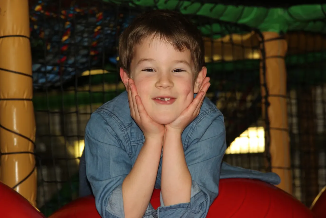 Child on soft-play frame at Jangala Soft Play Hilton