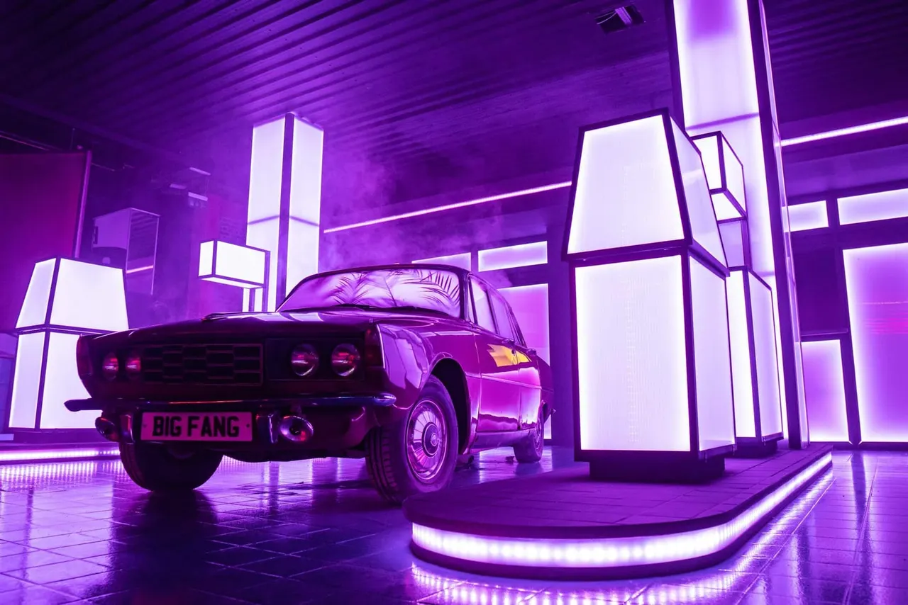 Vintage BIG FANG car set-piece under purple neon on Golf Fang Nottingham course