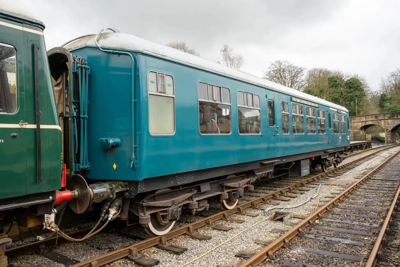 Heritage railway train in Derbyshire countryside