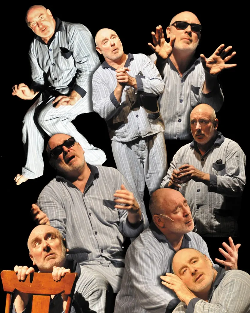 Multiple male performers in light blue shirts strike exaggerated comedic poses against a black background.