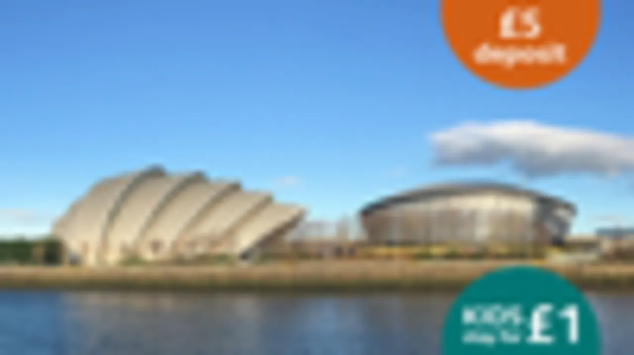 This image is a GRAPHIC — it shows promotional overlay badges on a blurred background photograph of modern riverside buildings and water.