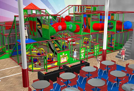 Large indoor play structure with slides, tunnels and climbing equipment, with seating area in foreground where children play.