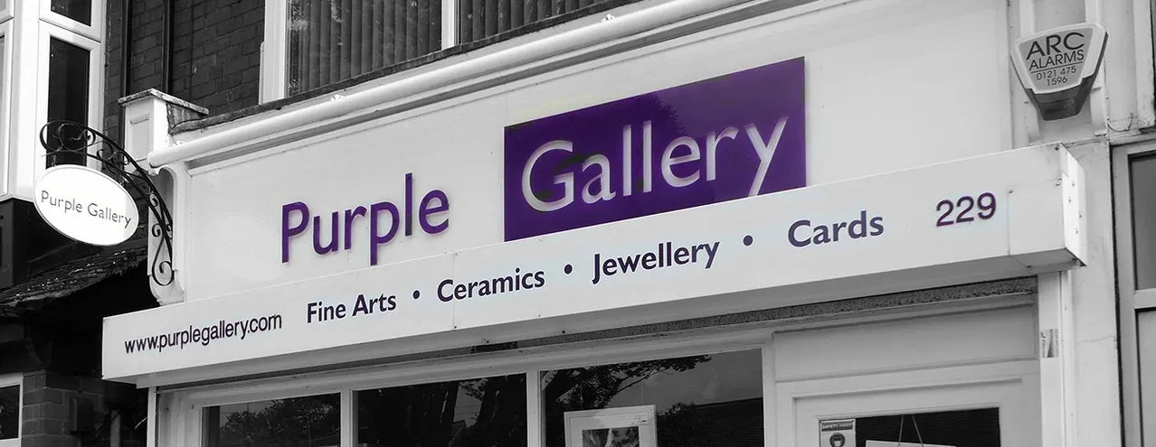 This is a designed graphic — a storefront sign.

GRAPHIC
