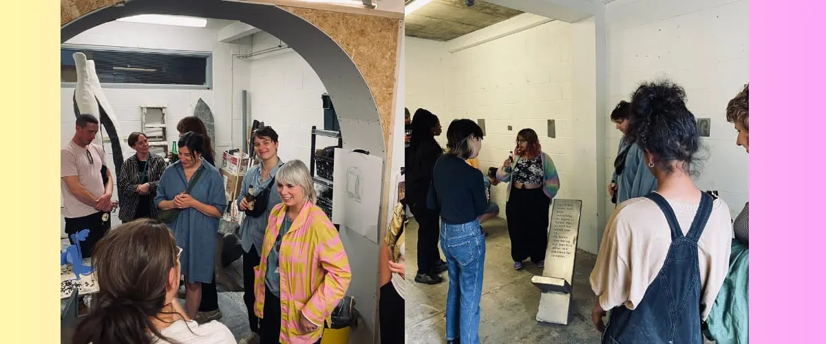 Groups of visitors mingle in a contemporary art studio space with white walls and industrial features.
