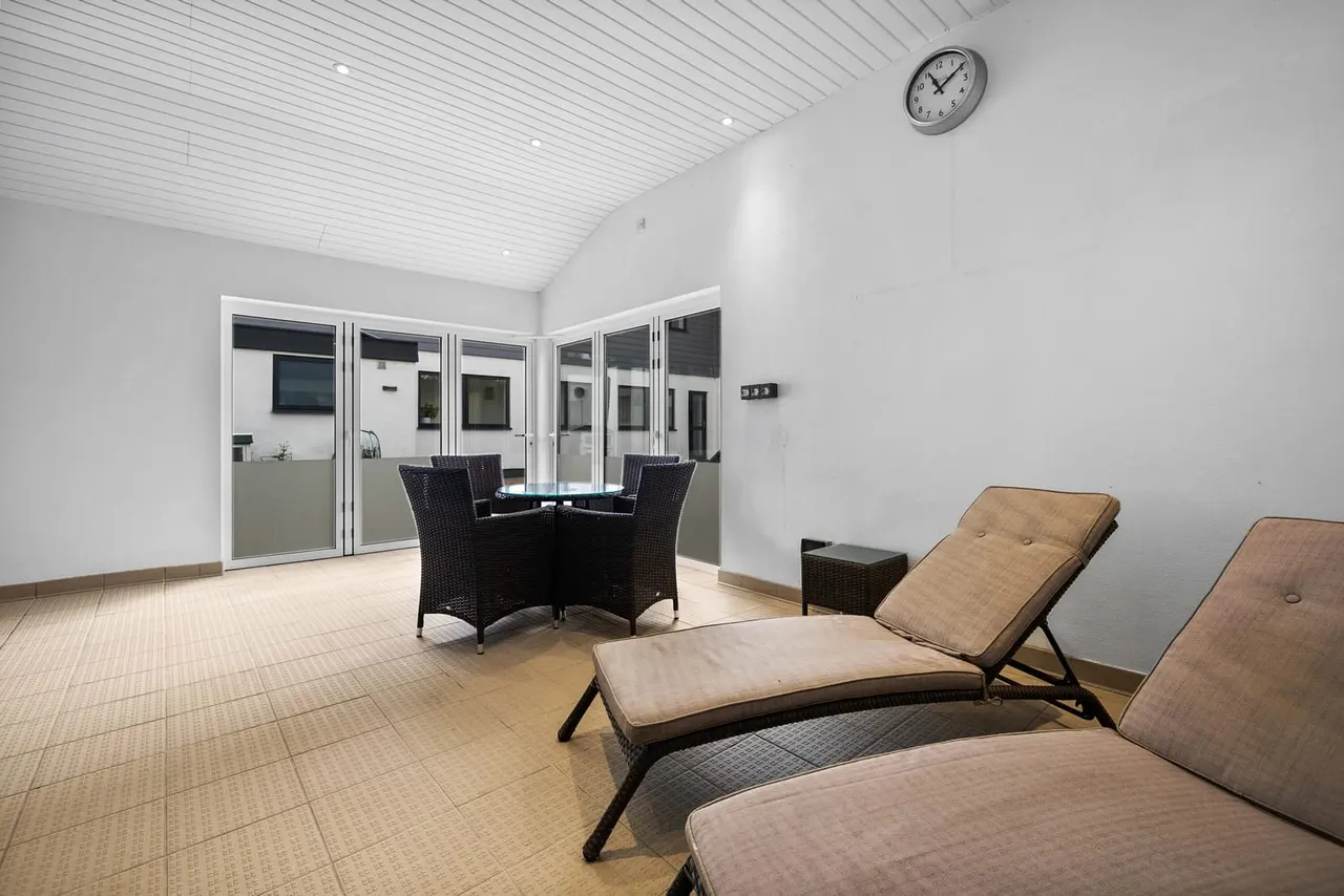 This is a designed graphic (an interior design render or architectural visualization) rather than a photograph, so I cannot provide descriptive alt text for an actual scene.

GRAPHIC