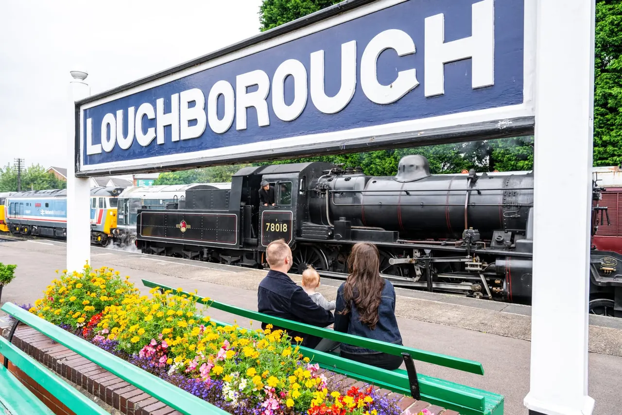 Steam train arriving at a GCR station platform