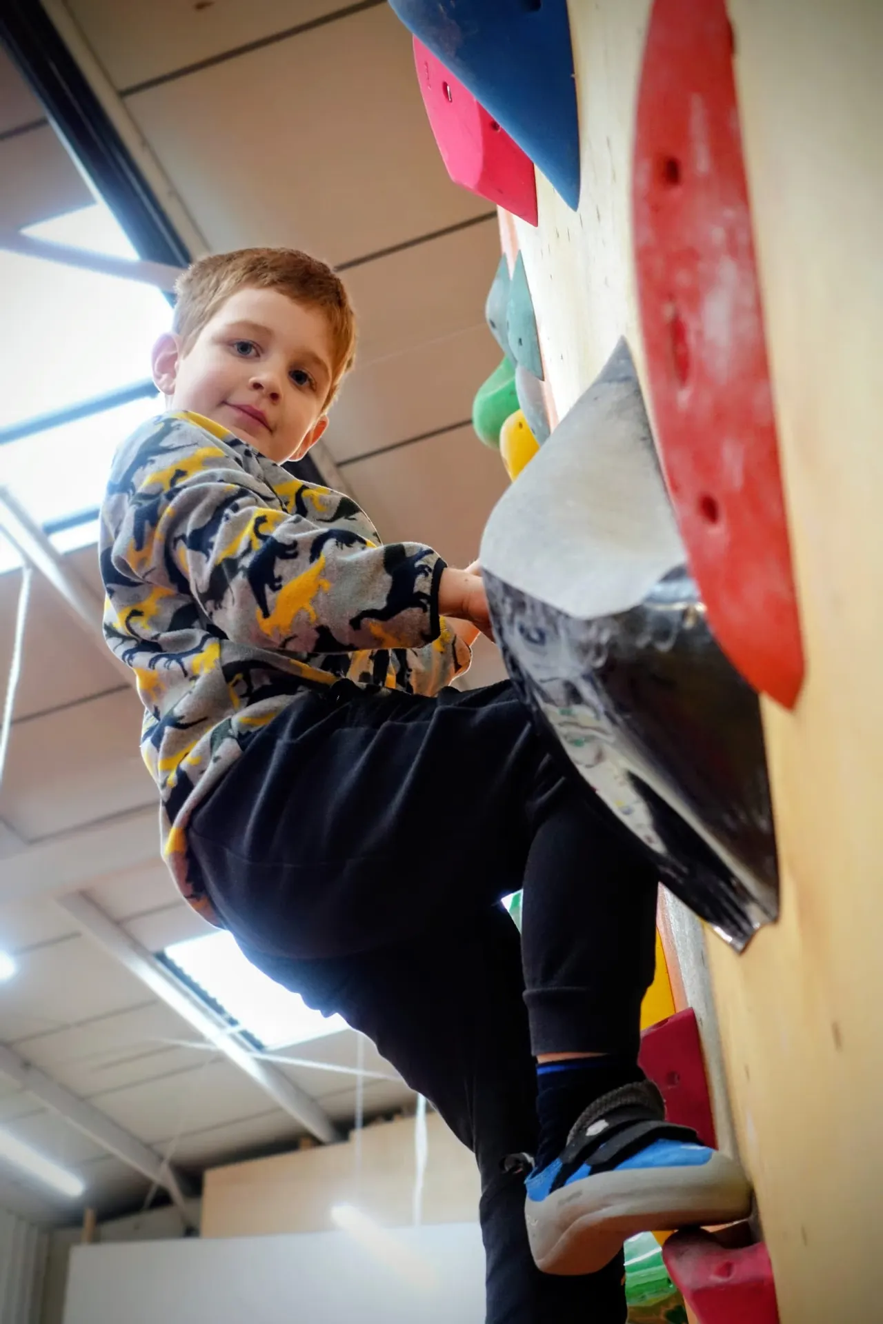 Child climbing at a Social Climbing party