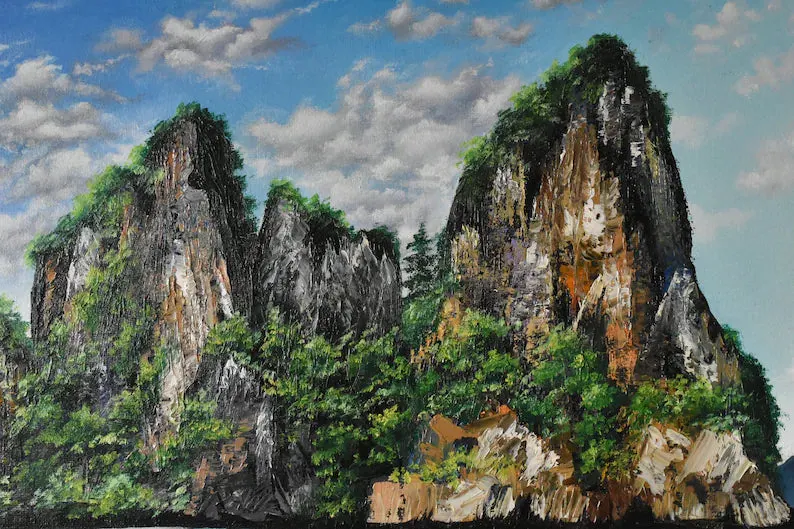 This is a designed graphic — a painted or illustrated artwork depicting dramatic limestone rock formations with lush green vegetation.

GRAPHIC