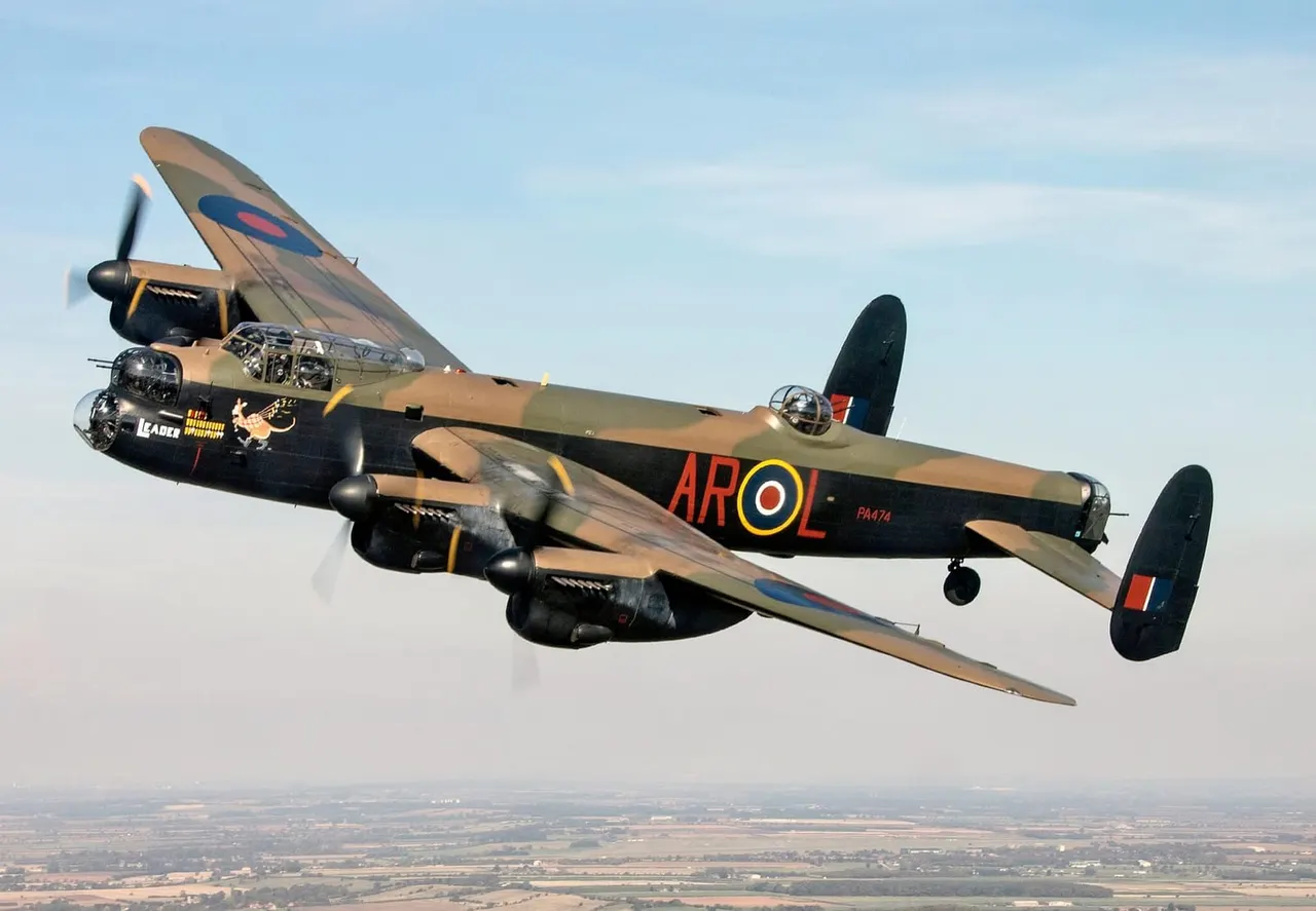 Historic RAF Lancaster bomber aircraft in flight above countryside landscape under clear sky.