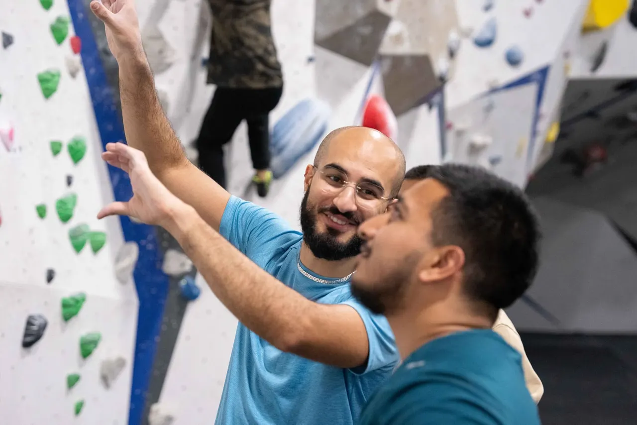Indoor bouldering walls with colourful holds inside The Tram Depot climbing centre.