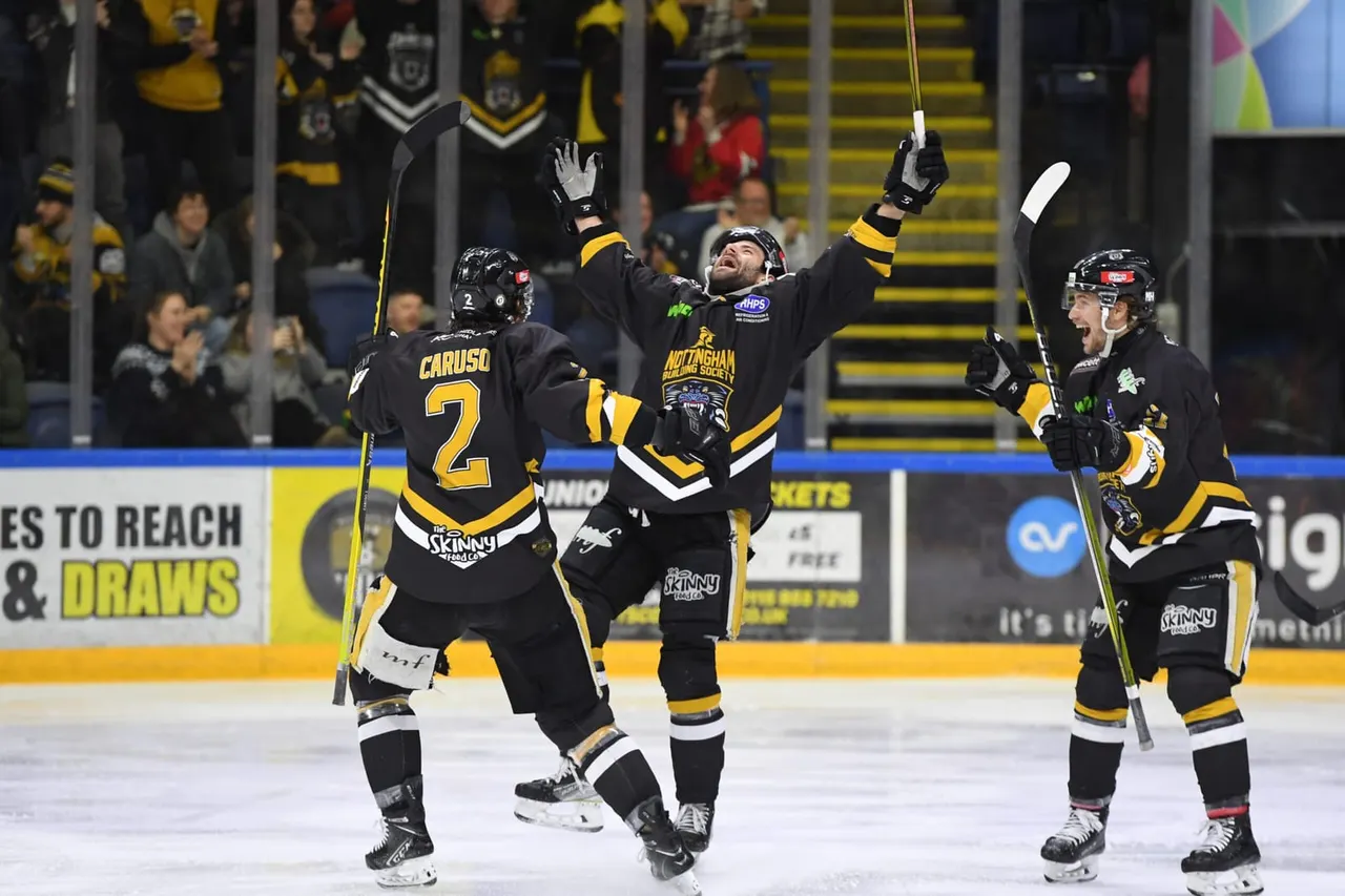 Ice hockey players competing on the Motorpoint Arena rink during a Nottingham Panthers home game