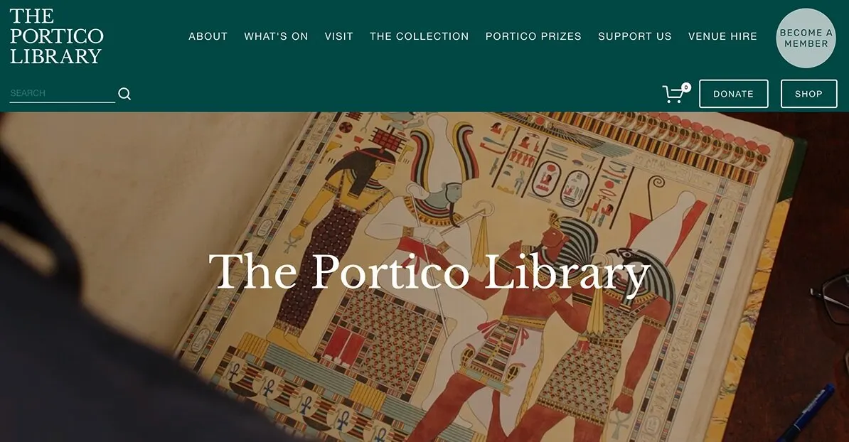 An open book displaying ancient Egyptian illustrations of figures in traditional dress and hieroglyphic text.