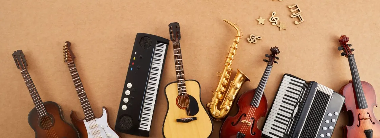 Arranged collection of musical instruments including guitars, keyboards, saxophones and string instruments on a beige background with decorative musical symbols.