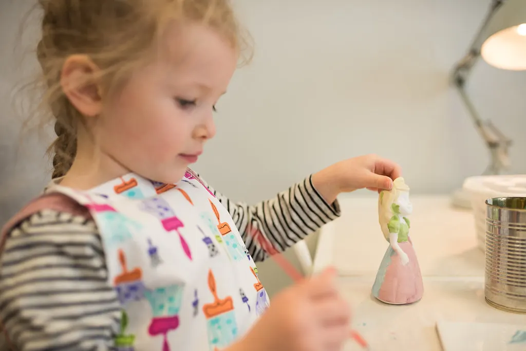 Studio pottery painting scene at The Paint Pottle
