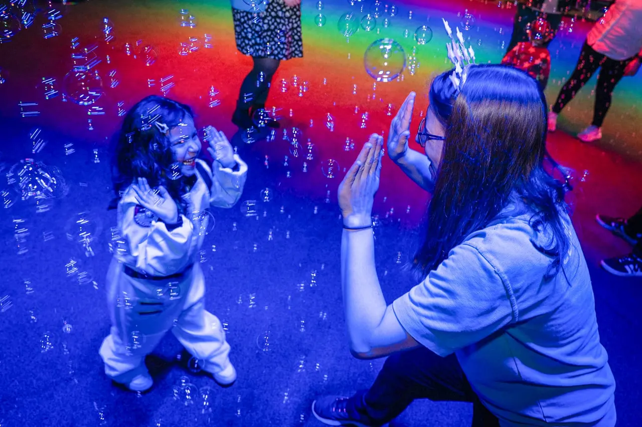 Family exploring the National Space Centre galleries